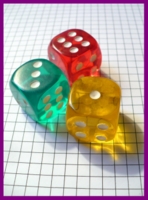 Dice : A Dice - 6D - 3 Yellow Red and Green Clear Plastic With White Drilled Pips